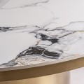 Luxusní art deco kulatý jídelní stůl Dorienne se zlatou nohou a bílou vrchní deskou s mramorovým designem 150 cm