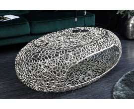 Designový glamour oválný konferenční stolek Hojí z kovu s podstavou s abstraktním vzorem a úložným prostorem