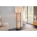 Designová etno stojací lampa Adduro s podstavou z černého kovu a masivního dřeva ve hnědé barvě s béžovým stínítkem 165 cm