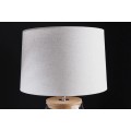 Stylov&aacute; skleněn&aacute; stoln&iacute; lampa Clasico s nohou v podobě průsvitn&eacute; n&aacute;doby s v&aacute;lcov&yacute;m b&eacute;žov&yacute;m st&iacute;n&iacute;tkem 60 cm
