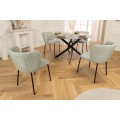 Designov&aacute; retro j&iacute;deln&iacute; židle Olive v jemn&eacute; pastelov&eacute; zelen&eacute; barvě s čern&yacute;mi nožičkami 75 cm