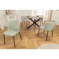 Designov&aacute; retro j&iacute;deln&iacute; židle Olive v jemn&eacute; pastelov&eacute; zelen&eacute; barvě s čern&yacute;mi nožičkami 75 cm