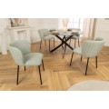 Designov&aacute; retro j&iacute;deln&iacute; židle Olive v jemn&eacute; pastelov&eacute; zelen&eacute; barvě s čern&yacute;mi nožičkami 75 cm