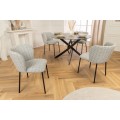 Designov&aacute; retro boucle j&iacute;deln&iacute; židle Olive v zelen&eacute; barvě s čern&yacute;mi nožičkami 75 cm