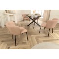 Designov&aacute; retro j&iacute;deln&iacute; židle Olive v meruňkov&eacute; barvě s vroubkovan&yacute;m potahem s čern&yacute;mi nožičkami 75 cm