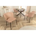 Designov&aacute; retro j&iacute;deln&iacute; židle Olive v meruňkov&eacute; barvě s vroubkovan&yacute;m potahem s čern&yacute;mi nožičkami 75 cm