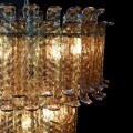Luxusní glamour kulatý třístupňový závěsný lustr Melinda v měděné barvě se skleněným stínítkem a kovovou konstrukcí 88 cm