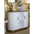 Art deco dvoudvířkový oválný konzolový stolek Glamia Blanc s hnědou deskou a bílým vroubkovaným korpusem 121 cm