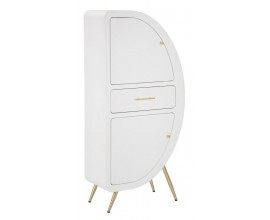 Glamour skříňka Anila v bílé barvě v atypickém tvaru s jednou zásuvkou a dvěma dvířky s nožičkami z kovu ve zlaté barvě s kovovými zlatými úchytkami s půlobloukovým tvarem