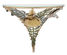 Designový glamour nástěnný konzolový stolek Exotica s polobloukovou vrchní deskou ze skla a konstrukcí z kovu ve zlaté barvě s bohatým zdobením v podobě kovových květů a listů v odstínech zelené a černé a béžové