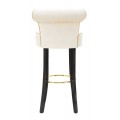 Designová art deco barová židle Vivienne s bílým potahem s černými nožičkami se zlatými detaily 96 cm