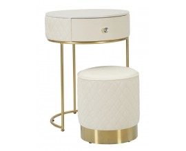 Designov&aacute; glamour sada kulat&eacute;ho toaletn&iacute;ho stolku a taburetky Glamia Tapis&eacute; s čalouněn&iacute;m z ekokůže s kr&eacute;mově b&eacute;žov&eacute;m odst&iacute;nu s vrchn&iacute; deskou s designem b&iacute;l&eacute;ho mramoru se z&aacute;suvkou a podstavami z kovu ve zlat&eacute; barvě