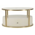 Art deco konferenční stolek Glamia Tapisé se zlatým kovovým rámem s kulatou bílou mramorovou deskou a čalouněnou spodní částí s diamantovým vzorem se dvěma zásuvkami