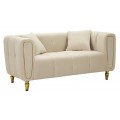 Designová art deco dvousedačka Celestia s textilním potahem v béžové barvě s ozdobnými prvky na opěrce a kovovými tvarovanými nožičkami ve zlaté barvě se dvěma polštáři a mohutnou lineární siluetou