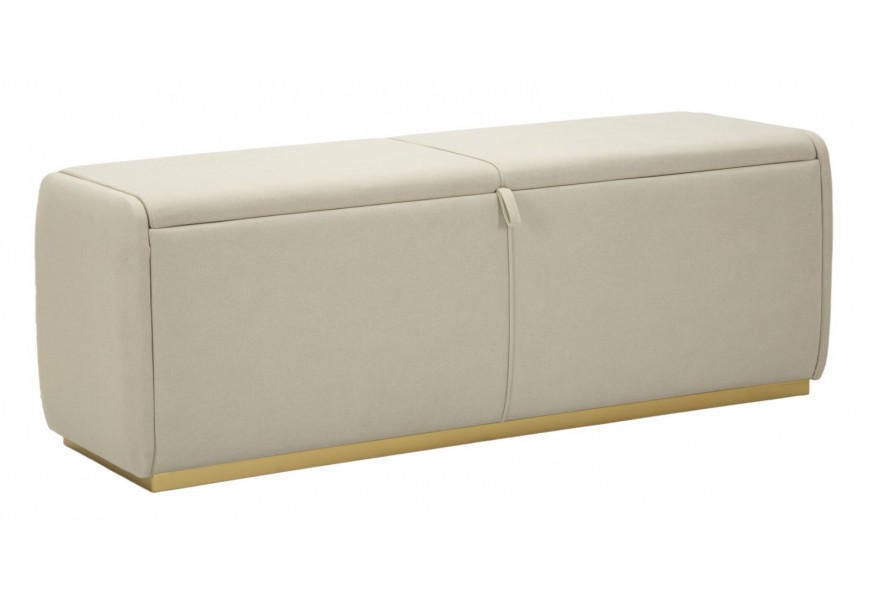 Modern&iacute; designov&aacute; lavice Monde s &uacute;ložn&yacute;m prostorem se světl&yacute;m &scaron;ed&yacute;m čalouněn&iacute;m a zlatou podstavou 130 cm