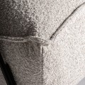 Luxusní čalouněné bouclé industriální houpací křeslo Miria s šedým potahem s černou kovovou konstrukcí 96 cm