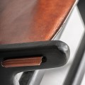 Luxusní vintage cihlově červené kožené křeslo Huron s černými dřevěnými nožičkami 82 cm