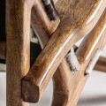 Luxusní vintage kožené křeslo Huron se srstí se zvířecím bílo černým vzorem s hnědou dřevěnou konstrukcí 82 cm