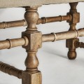 Luxusní koloniální dvoumístná šedá lavice Teria se lněným potahem s nýty s masivními hnědými vyřezávanými nožičkami 128 cm