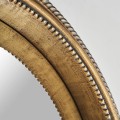 Luxusní vintage kulaté nástěnné zrcadlo Malisa ve zlaté starožitné barvě s vyřezávaným rámem s kovovým efektem 81 cm