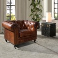 Luxusní chesterfield křeslo Hastings s potahem z pravé kůže v koňakovém hnědém odstínu s designovými kolečky 120 cm