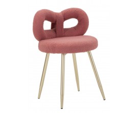 Modern&iacute; glamour čalouněn&aacute; boucl&eacute; j&iacute;deln&iacute; židle Janar s růžov&yacute;m potahem a kovov&yacute;mi zlat&yacute;mi nožičkami 67 cm