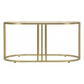 Glamour kovový zlatý oválný konferenční stolek Jméno s vrchní deskou z jemně průhledného skla 50 cm