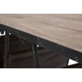 Industriální obdélníkový konferenční stolek Duane s hnědou dřevěnou deskou a černou podstavou s držákem na časopisy 120 cm