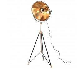 Luxusní retro stojací lampa Mara s lesklým zlatým nastavitelným stínítkem s tvarem reflektoru s černou trojnohou konstrukcí se zlatými detaily a centrální tyčí potaženou pravou kůží