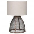 Designová vintage stolní lampa Crowy s nohou z tmavého kovu s hnědou rezavou patinou s mřížkovanou výplní a kulatým textilním stínítkem s příměsí lnu v bílé barvě