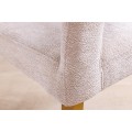 Moderní art deco čalouněná béžová jídelní židle Lunit s texturovaným potahem a kovovými zlatými nožičkami 81 cm