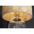 Designová glamour noční lampa Gambier se zlatým stínítkem se vzorem palmových listů a průhlednou skleněnou nohou 47 cm