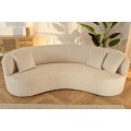 Designová art deco sedačka Jina v polobloukovém tvaru s béžovým potahem z buklé látky a třemi polštáři 229 cm