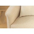 Designová moderní sedačka Jina oválného tvaru s bouclé potahem v krémové béžové barvě a čtyřmi polštáři 340 cm