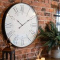 Vintage kulaté nástěnné hodiny Union Station s černým rámem a římskými čísly s jemnou patinou 80 cm