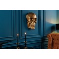 Glamour nástěnná dekorace Skull ve tvaru realistické zlaté lebky z kovu s lesklým povrchem 40 cm