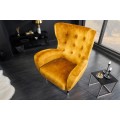 Art deco křeslo Bolte s hořčicovým žlutým sametovým potahem a vysokou zádovou opěrkou s designem ušáku 106 cm