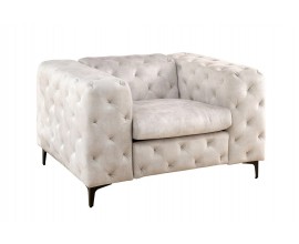 Designové chesterfield čalouněné béžové křeslo Limonny se sametovým potahem s hlubokým bodovým prošíváním s hranatými opěrkami a černými kovovými nožičkami