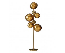 Glamour stojací lampa Liquido se zlatou kovovou konstrukcí a sedmi skleněnými stínítky jako medové kapky v různých velikostech