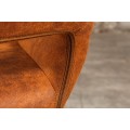 Industri&aacute;ln&iacute; hněd&aacute; kožen&aacute; j&iacute;deln&iacute; židle Mustang s vintage vzhledem s čern&yacute;mi kovov&yacute;mi nožičkami a b&iacute;l&yacute;m pro&scaron;&iacute;v&aacute;n&iacute;m 79 cm