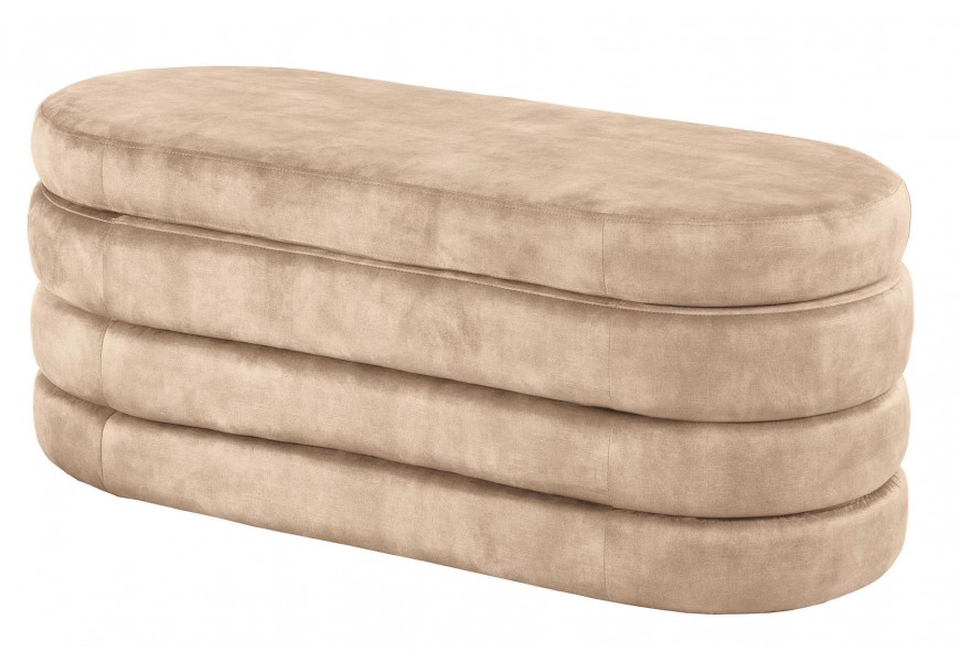 Moderní oválná lavice Eliana s vrstveným designem a úložným prostorem v šampaňské béžové sametové látce 113 cm
