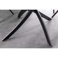 Moderní kulatý jídelní stůl Valldemossa s bílou vrchní deskou s mramorovým designem a překříženýma nohama 120 cm