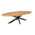 Designový industriální jídelní stůl Comedor s oválnou vrchní deskou z masivního mangového dřeva v naturální světle hnědé barvě s výraznou strukturou a tmavou patinou s podstavou z kovu v černé barvě se čtyřmi zkříženýma hranatýma nohama