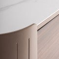 Luxusní designová oválná hnědá komoda Grisham se šesti šuplíky a bílou mramorovou deskou a černou podstavou 140 cm
