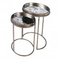 Industriální sada oválných kovových příručních stolků Rust se stříbrnou patinou a zrcadlovou deskou s motivem palem 67 cm
