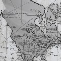 Vintage nástěnný obraz World Map s hnědým dřevěným rámem a sklem s motivem mapy světa 117 cm