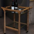 Designový servírovací vozík Arbor z masivního dubového hnědého dřeva se dvěma skleněnými policemi na kolečkách 70 cm