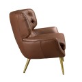 Luxusní moderní křeslo Sayron s tmavým hnědým potahem z pravé kůže s chesterfield prošíváním a zlatýma nohama 85 cm