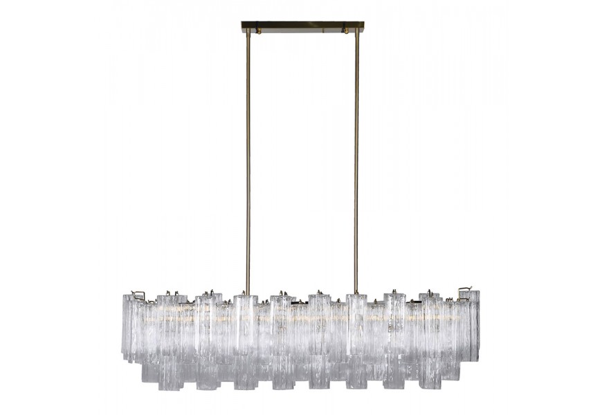 Luxusní skleněný lustr Ayva se stínítkem ve tvaru obdélníku z průhledných trubiček s konstrukcí z kovu ve zlaté barvě na dvou závěsných lankách Luxusní skleněný lustr Ayva se stínítkem ve tvaru obdélníku z průhledných trubiček s konstrukcí z kovu ve zlaté barvě na dvou závěsných lankách