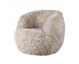 Luxusn&iacute; otočn&eacute; křeslo Mariela v kr&eacute;mov&eacute; barvě s kože&scaron;inov&yacute;m potahem s kr&aacute;tk&yacute;m vlasem s obl&yacute;mi opěrkami v kulat&eacute;m tvaru